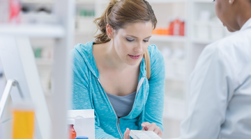 woman in pharmacy